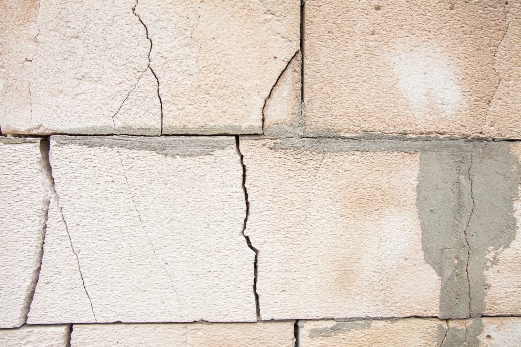 An unsealed foundation crack in a home.